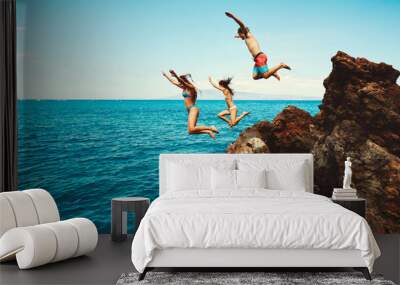 Friends cliff jumping into the ocean Wall mural