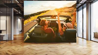 Happy Couple Driving in Convertible Wall mural