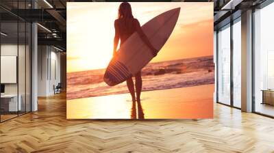 silhouette surfer girl on the beach at sunset Wall mural