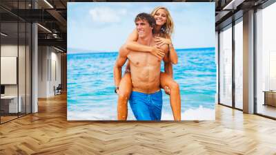 Young Couple on Tropical Beach Wall mural