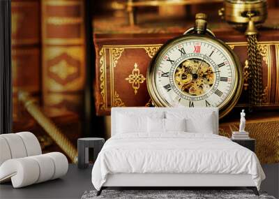 Pocket watch and old books Wall mural