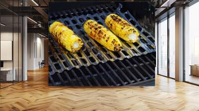 Grilling corn on the cob on a barbecue Wall mural