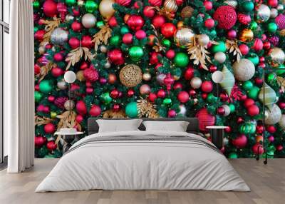 Red and green holiday ornaments on a Christmas tree Wall mural