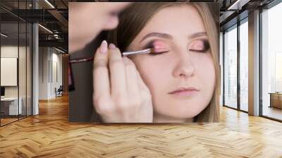  Face, hand working, pink make up Wall mural