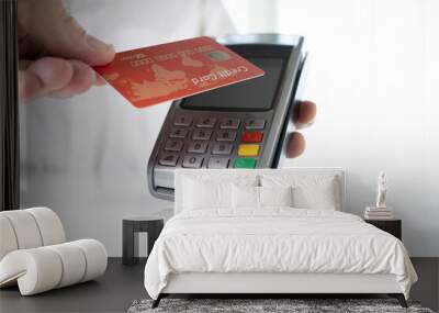 Hand Of man Paying With Contactless Credit Card, Nfc Technology Wall mural