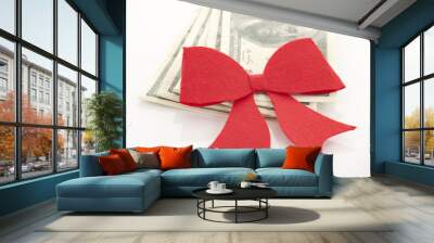 Money, gift wrapped in red bow and ribbon, one hundred dollars b Wall mural