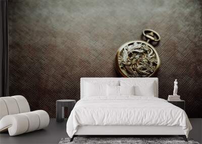 old clock with shackle on brown background Wall mural