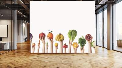 Hands holding different vegetables and fruit on isolated background Wall mural