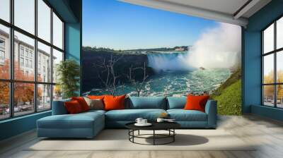 Niagara Falls, Canada, Sept 2019, view of a Hornblower Niagara Falls boat tour in the Horseshoe Falls mist Wall mural