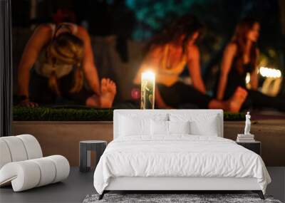 Night Yoga Stretch by Candlelight Wall mural