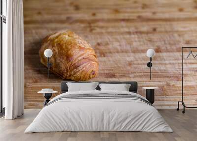 pain au chocolat on wooden background Wall mural