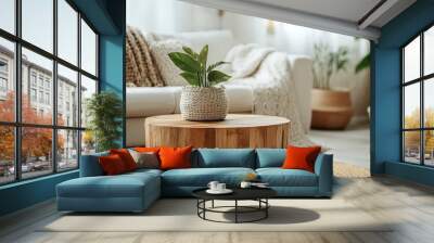 Round wood coffee table against white sofa. Scandinavian home interior design of modern living room Wall mural