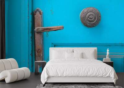 Close up of antique metal handle on wooden blue door, Mykonos, Greece  Wall mural