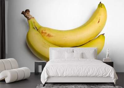 Two bananas are displayed on a white background. Wall mural