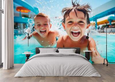 Children playing and splashing in a waterpark pool, capturing the essence of summer fun. Wall mural