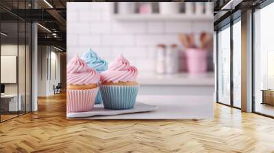 An assortment of cupcakes, adorned with colorful frosting and sprinkles Wall mural