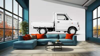 A white truck with a cargo bed is parked on a white background Wall mural