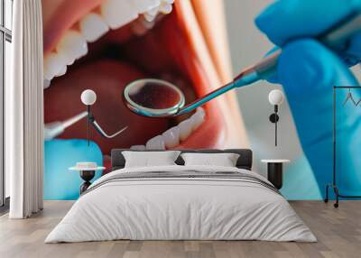 The dentist looks at the patient's teeth. Selective focus. Wall mural