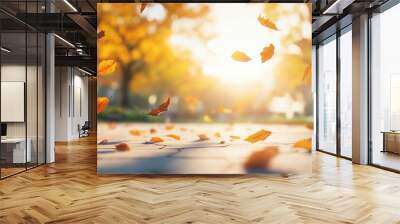 Wooden table with blurred beautiful autumn ambience background. Wall mural