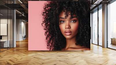 Enigmatic Beauty with Lush Curls, Deep Gaze, Pastel Pink Backdrop, Exquisite Black Woman, Rich Hair Texture, Serene Expression, Natural Makeup Elegance, Soft Lighting, Fashion Portrait, Afro-Textured  Wall mural