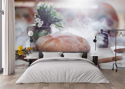 Freshly baked traditional bread on wooden table Wall mural