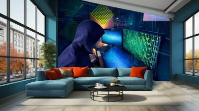 Hacking and malware concept. Hacker using abstract laptop with binary code digital interface. Wall mural