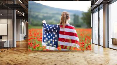 Patriot woman holding the american flag on the 4th of July Wall mural