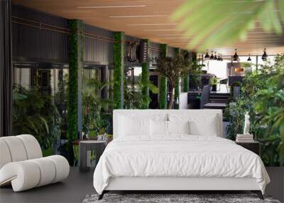 Restaurant in a modern style with green plants. Ecology design. Wall mural