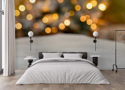 Vintage wooden table wit Christmas bokeh lights. Wall mural