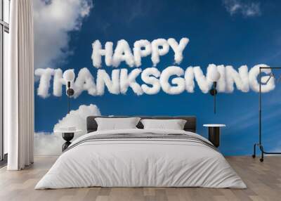 happy thanksgiving word made of clouds in blue sky background Wall mural