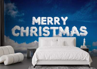 merry christmas word made of clouds in blue sky background Wall mural