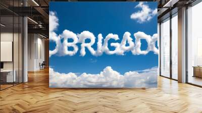 obrigado word made of clouds in blue sky background Wall mural