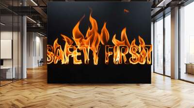 safety first word made of fire flame on black background Wall mural