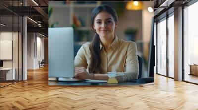 Smiling Businesswoman at Her Desk Wall mural