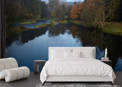 View on the river Semois in Chiny Belgium with reflections in Autumn Wall mural