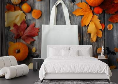  flat lay mockup of a single tote bag made from white canvas fabric with autumn fall and halloween decoration with pumpkins Wall mural