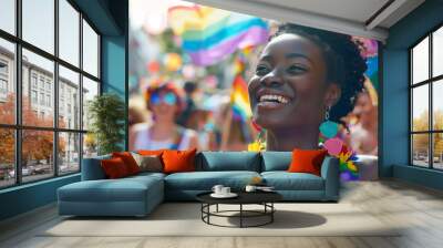 Happy young black woman smiling at the pride parade with lmbtq flags Wall mural