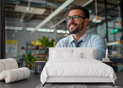 Young office worker in busines casual outfit in a modern office portrait  Wall mural