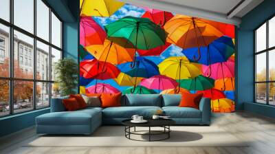 Lots of colorful umbrellas in the sky. City decoration Wall mural