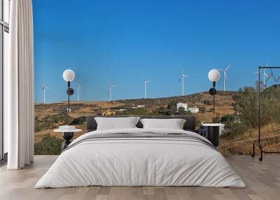 The landscape with wind power plant. Wind power station. Wind generators in the mountains. Alternative green renewable energy production. Panorama Wall mural