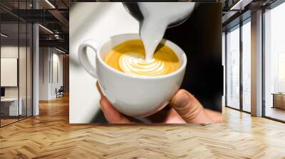 Coffee latte art barista skill closeup Wall mural