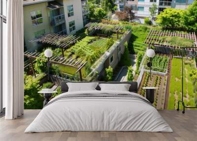 Green infrastructure and eco-friendly city homes with plants and gardens on roof tops, aerial view Wall mural