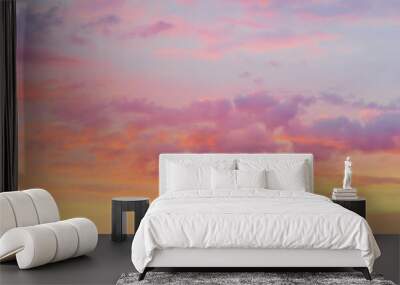 Dramatic bright colored clouds at sunset Wall mural