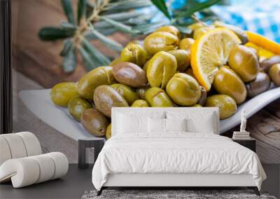 Cracked green olives. Cracked green olives with lemon. Turkish style olive (Turkish name; kirma zeytin) Wall mural