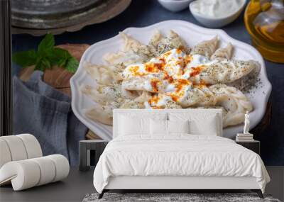 Traditional manti food on plate, top view. The concept of oriental cuisine. Uzbek food manty dumplings. (Turkish name; hinkel mantisi + cecen manti) Wall mural