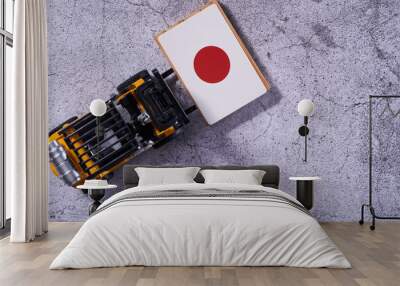 top view of toy forklift with flag on pallet Wall mural