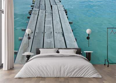 Old wooden pier for fishing and sea in background. Natural landscape. Wall mural