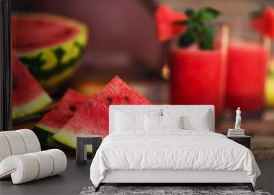 Watermelon on a rustic wooden background. Slices of juicy ripe red watermelon. Fresh juice. Cocktails and soft drinks. Refreshing summer drink. Wall mural