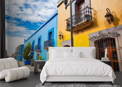 Oaxaca, Mexico-1 December, 2018: Scenic old city streets and colorful colonial buildings in historic city center Wall mural