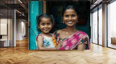 A woman and a little girl are smiling at the camera Wall mural